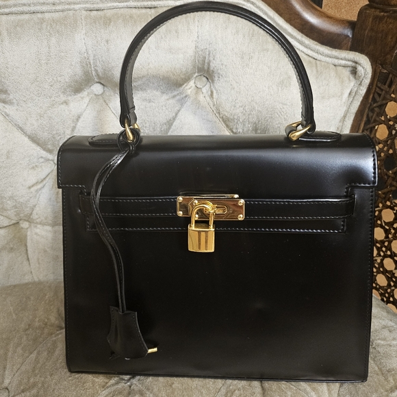 Nancy & Prima Handbags - Nancy &Prima black leather kelly type bag.